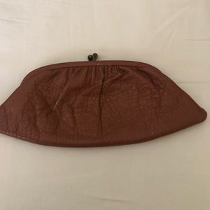 Vintage leather clutch very unique shape